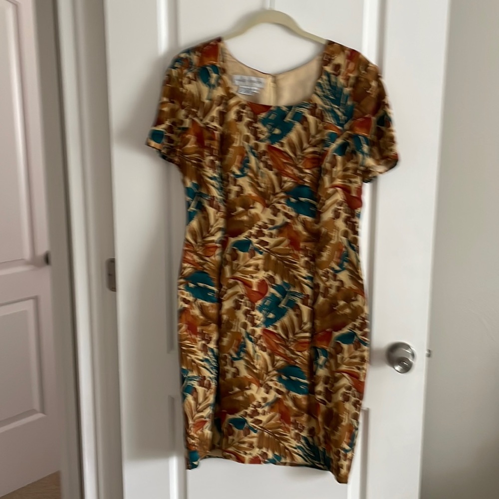 Beautiful multi colored dress , zip up back, excellent condition